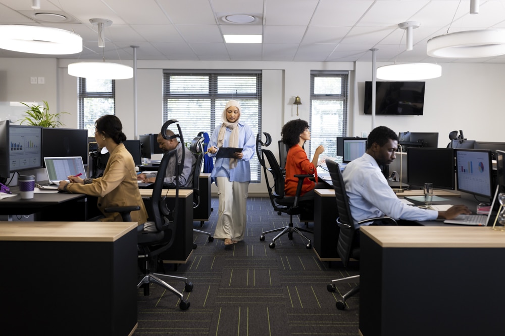 Diverse female and male businesspeople working in office with open space. Business, corporation, cooperation and working in office concept. Diverse female and male businesspeople working in office with open space. Business, corporation, cooperation and working in office concept.